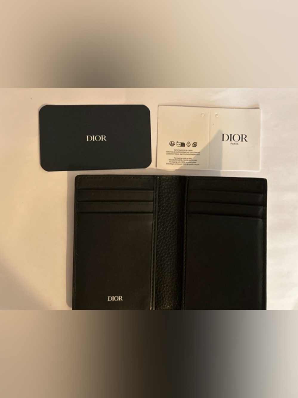 Dior black vertical bifold card holder, with silver metallic logo Full Inclusion